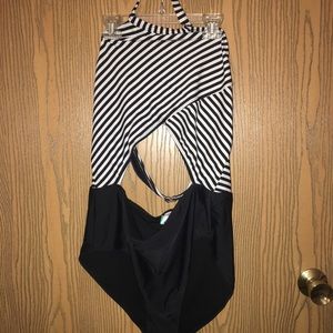 Open cut one piece bathing suit